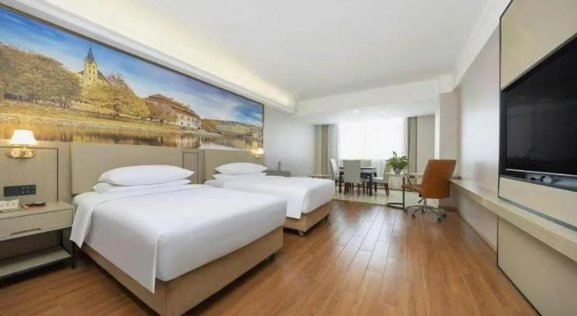 Bed in Vienna Hotel Yongzhou Dong'an High-Speed Railway Station