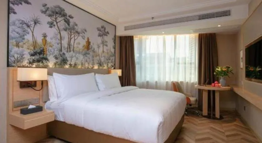 Bed in Vienna Hotel Yongzhou Dong'an High-Speed Railway Station