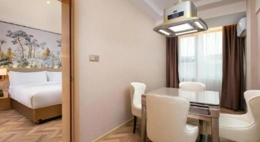 Bed in Vienna Hotel Yongzhou Dong'an High-Speed Railway Station