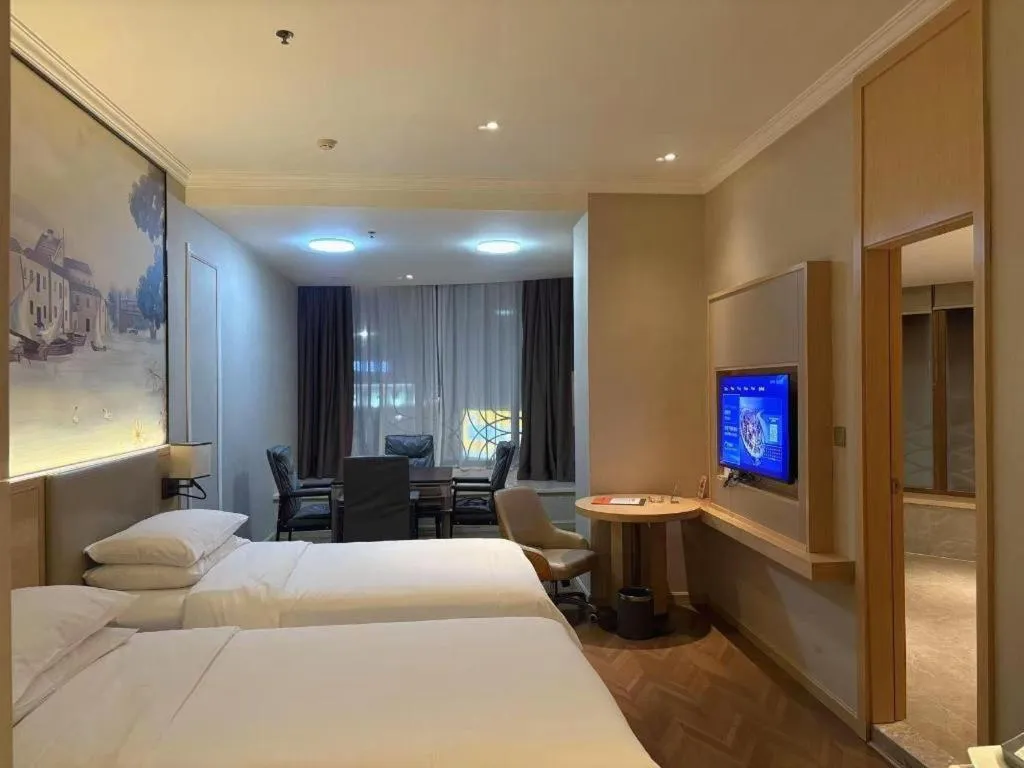 Bed in Vienna Hotel Yongzhou Dong'an High-Speed Railway Station