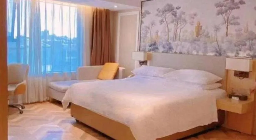 Bed in Vienna Hotel Yongzhou Dong'an High-Speed Railway Station