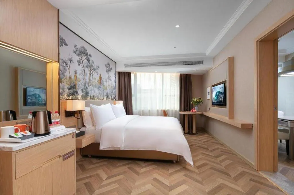 Bed in Vienna Hotel Yongzhou Dong'an High-Speed Railway Station