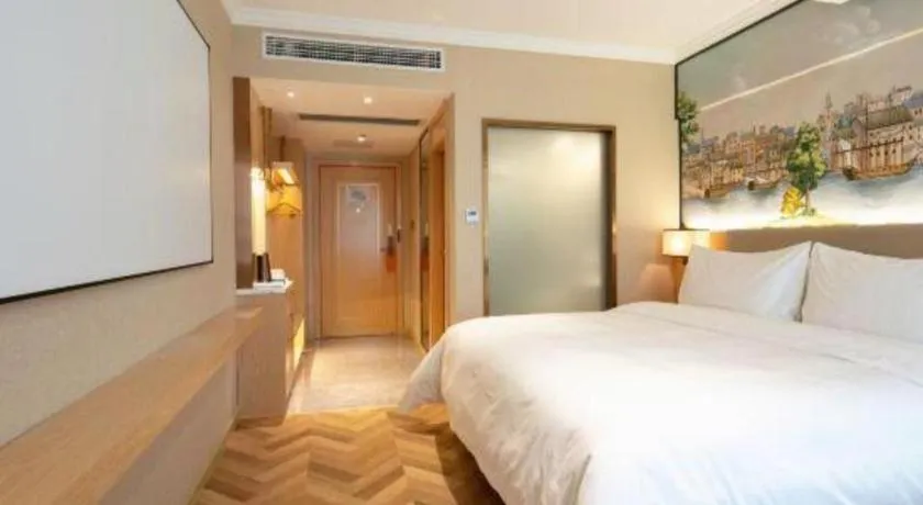 Bed in Vienna Hotel Yongzhou Dong'an High-Speed Railway Station