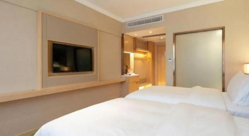 Bed in Vienna Hotel Yongzhou Dong'an High-Speed Railway Station