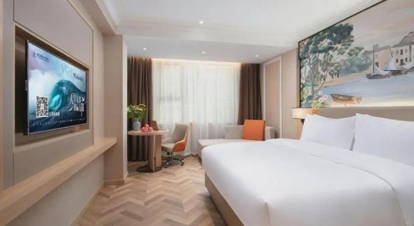 Bed in Vienna Hotel Yongzhou Dong'an High-Speed Railway Station