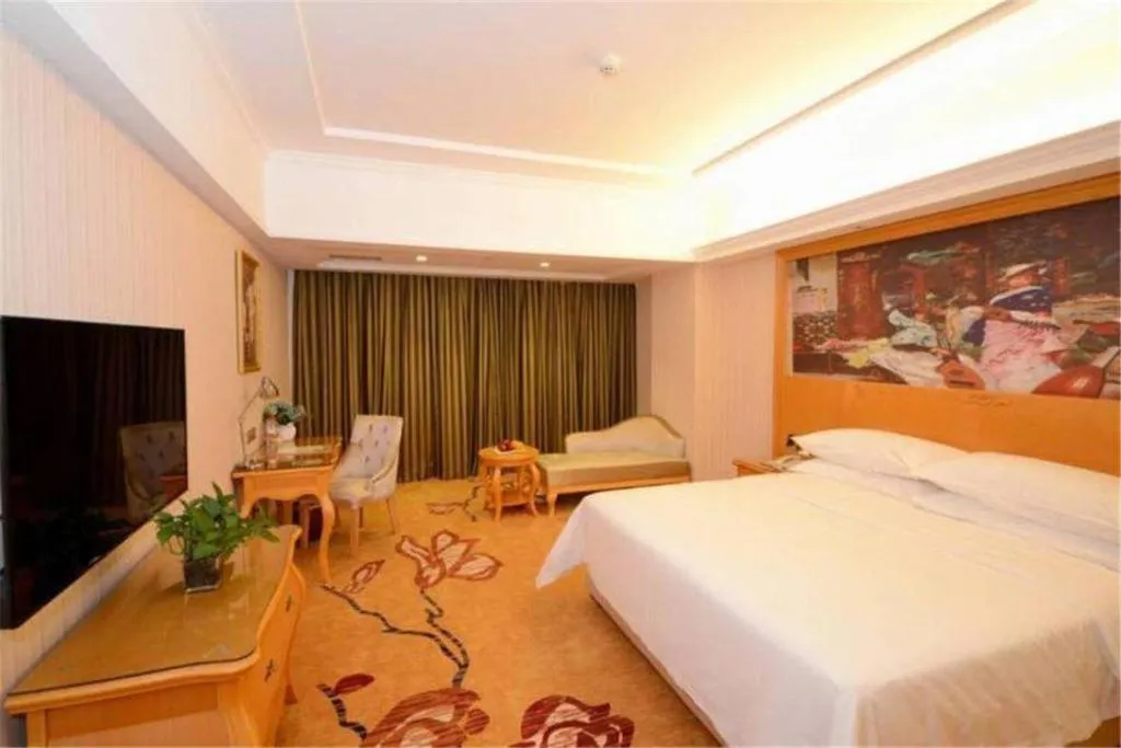 Bed in Vienna Hotel Henan Luoyang Jiudu Road Wanda
