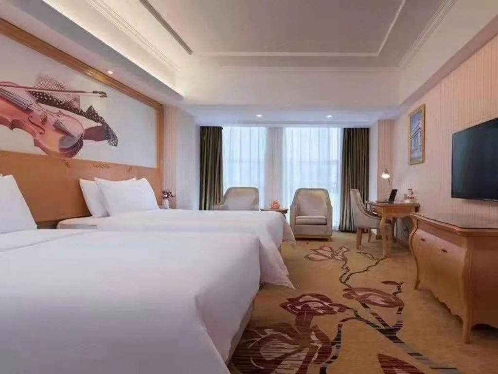 Bed in Vienna Hotel Henan Luoyang Jiudu Road Wanda