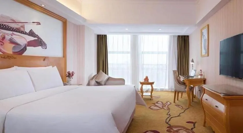 Bed in Vienna Hotel Henan Luoyang Jiudu Road Wanda