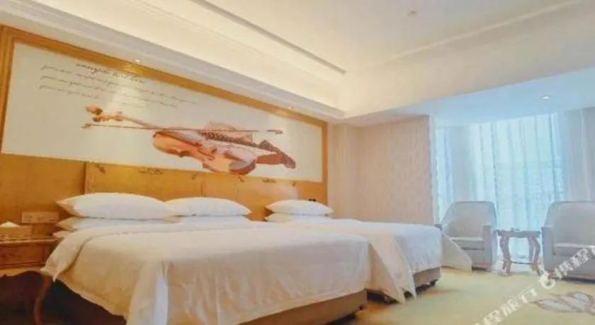 Bed in Vienna Hotel Henan Luoyang Jiudu Road Wanda