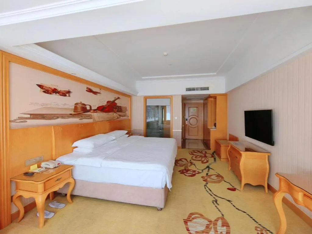 Bed in Vienna Hotel Henan Luoyang Jiudu Road Wanda