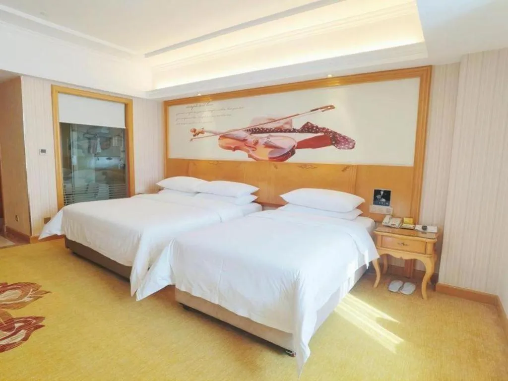 Bed in Vienna Hotel Henan Luoyang Jiudu Road Wanda