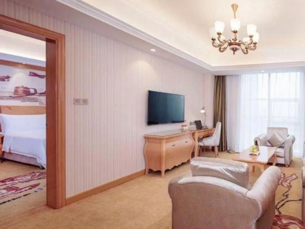 Bed in Vienna Hotel Henan Luoyang Jiudu Road Wanda