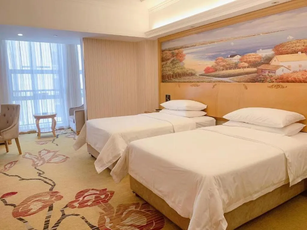 Bed in Vienna Hotel Henan Luoyang Jiudu Road Wanda