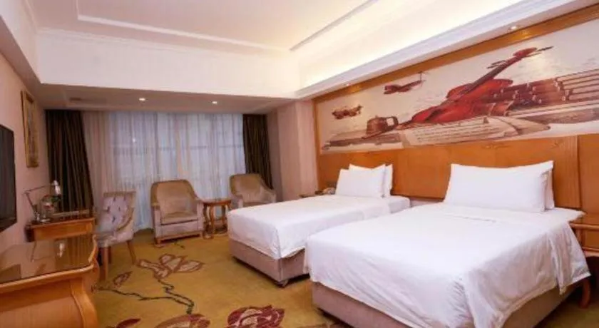 Bed in Vienna Hotel Henan Luoyang Jiudu Road Wanda