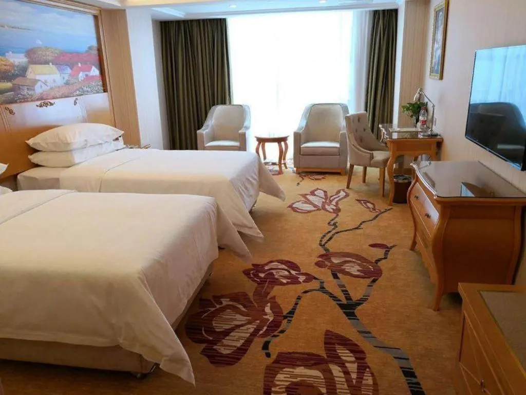 Bed in Vienna Hotel Henan Luoyang Jiudu Road Wanda