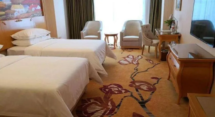 Bed in Vienna Hotel Henan Luoyang Jiudu Road Wanda