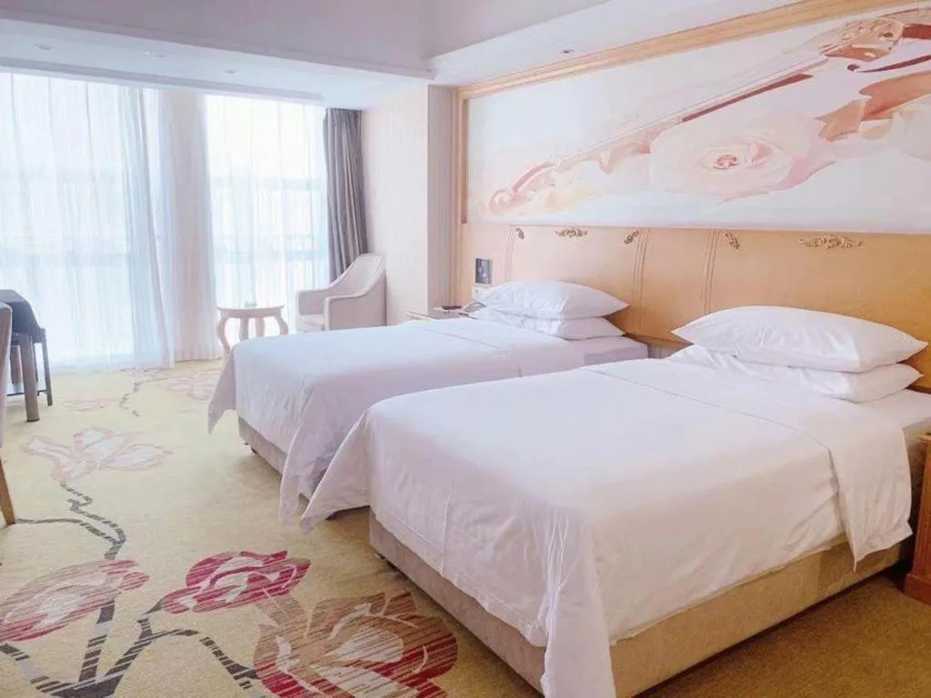 Bed in Vienna Hotel Henan Luoyang Jiudu Road Wanda