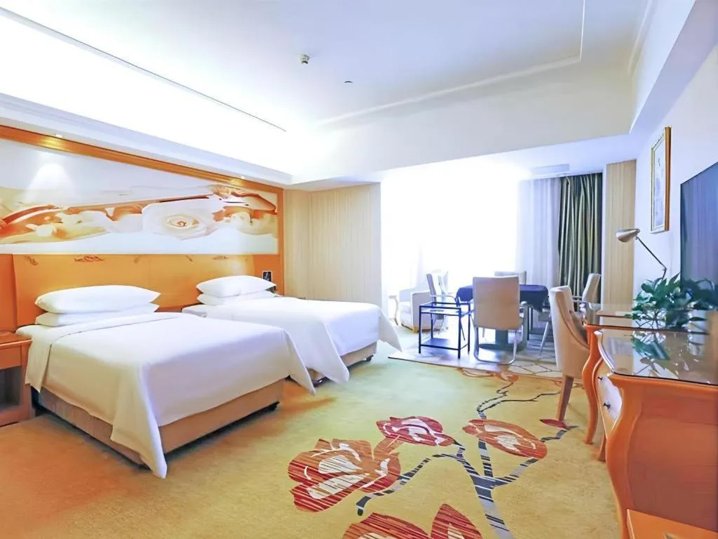 Bed in Vienna Hotel Henan Luoyang Jiudu Road Wanda