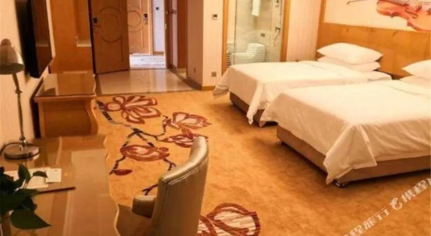 Bed in Vienna Hotel Henan Luoyang Jiudu Road Wanda