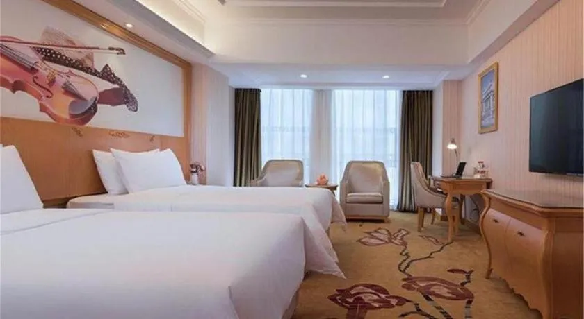 Bed in Vienna Hotel Henan Luoyang Jiudu Road Wanda