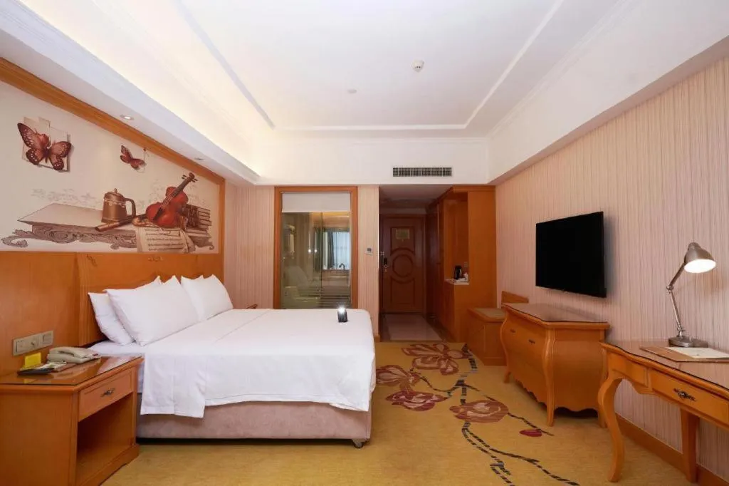 Bed in Vienna Hotel Henan Luoyang Jiudu Road Wanda