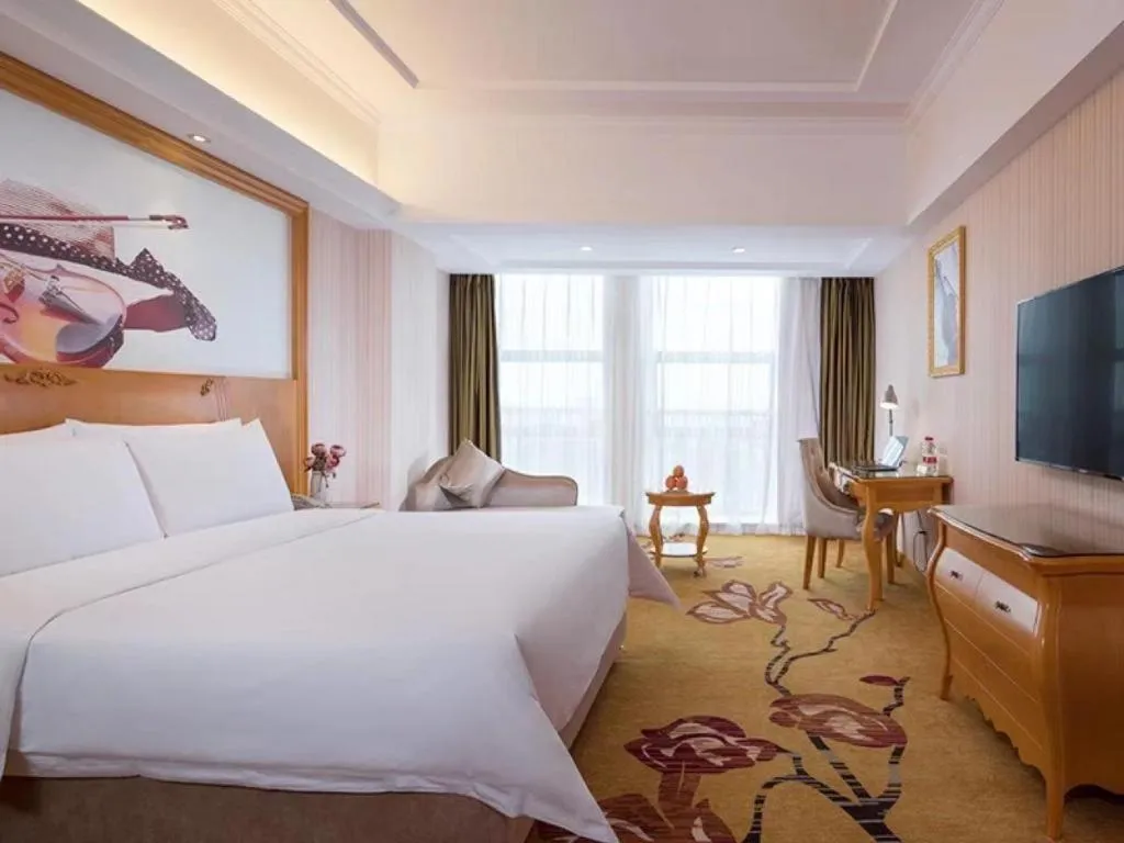Bed in Vienna Hotel Henan Luoyang Jiudu Road Wanda