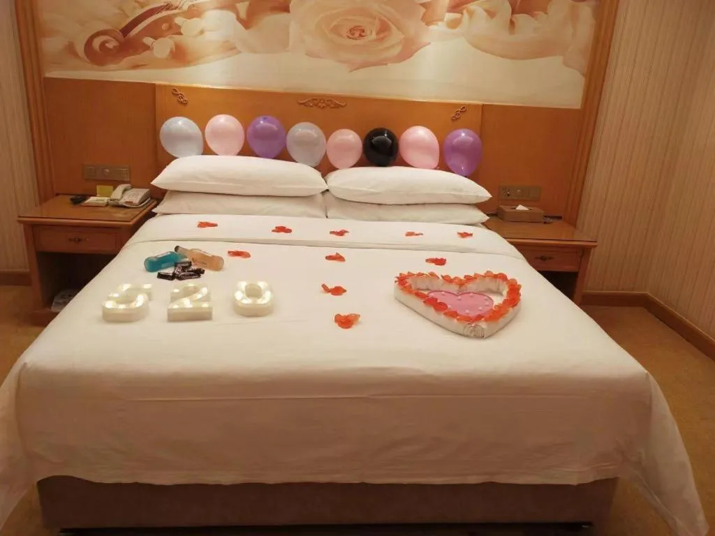 Bed in Vienna Hotel Henan Luoyang Jiudu Road Wanda