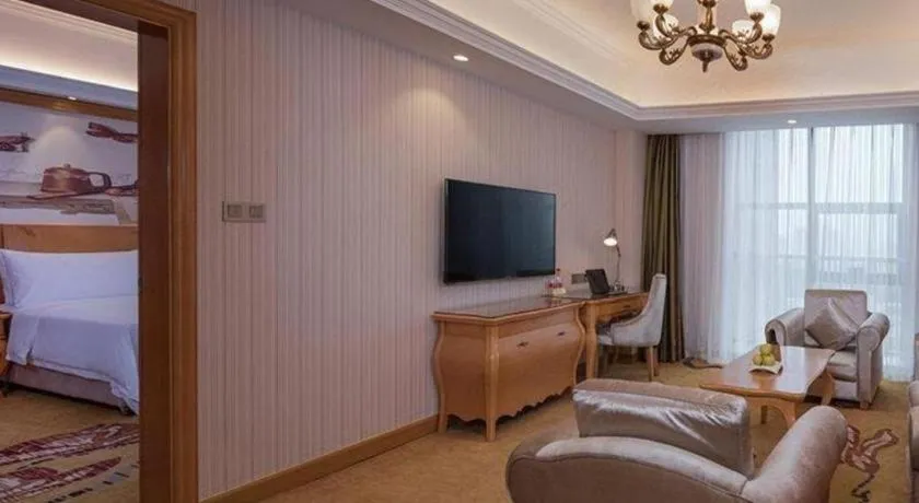 Bed in Vienna Hotel Henan Luoyang Jiudu Road Wanda