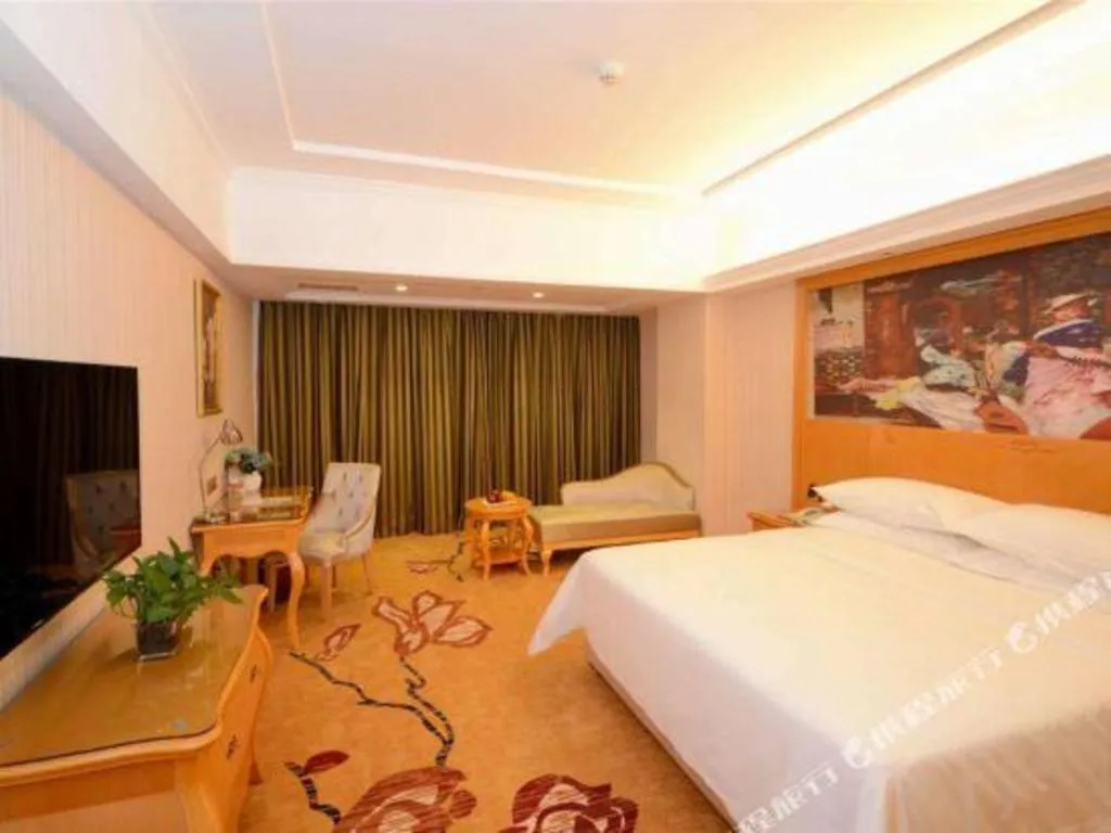 Bed in Vienna Hotel Henan Luoyang Jiudu Road Wanda