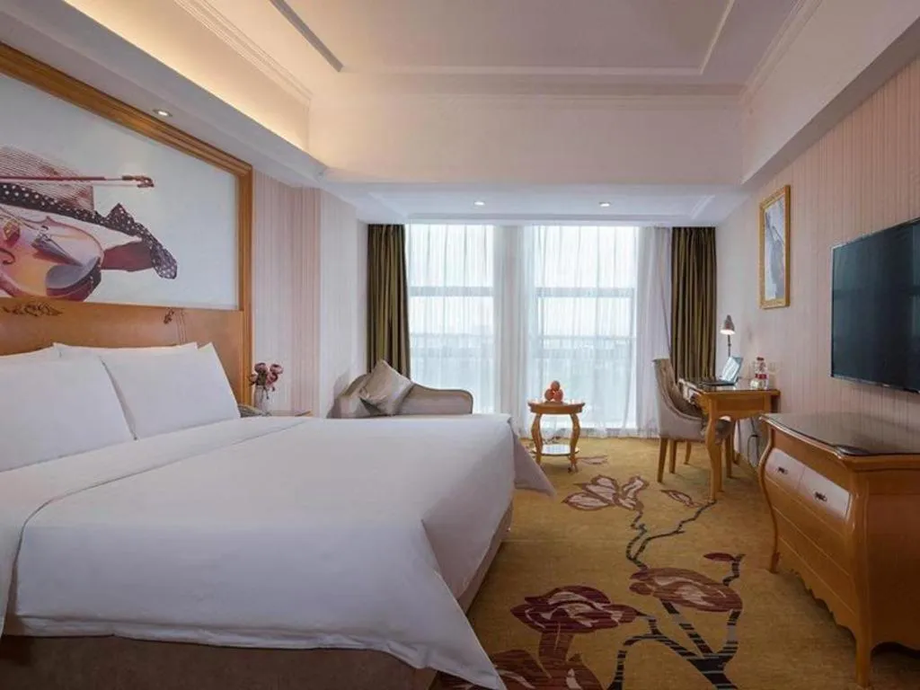 Bed in Vienna Hotel Henan Luoyang Jiudu Road Wanda