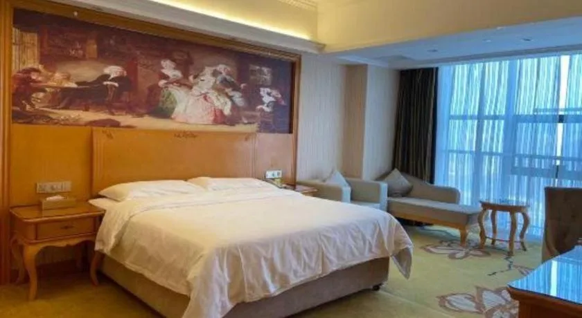 Bed in Vienna Hotel Henan Luoyang Jiudu Road Wanda
