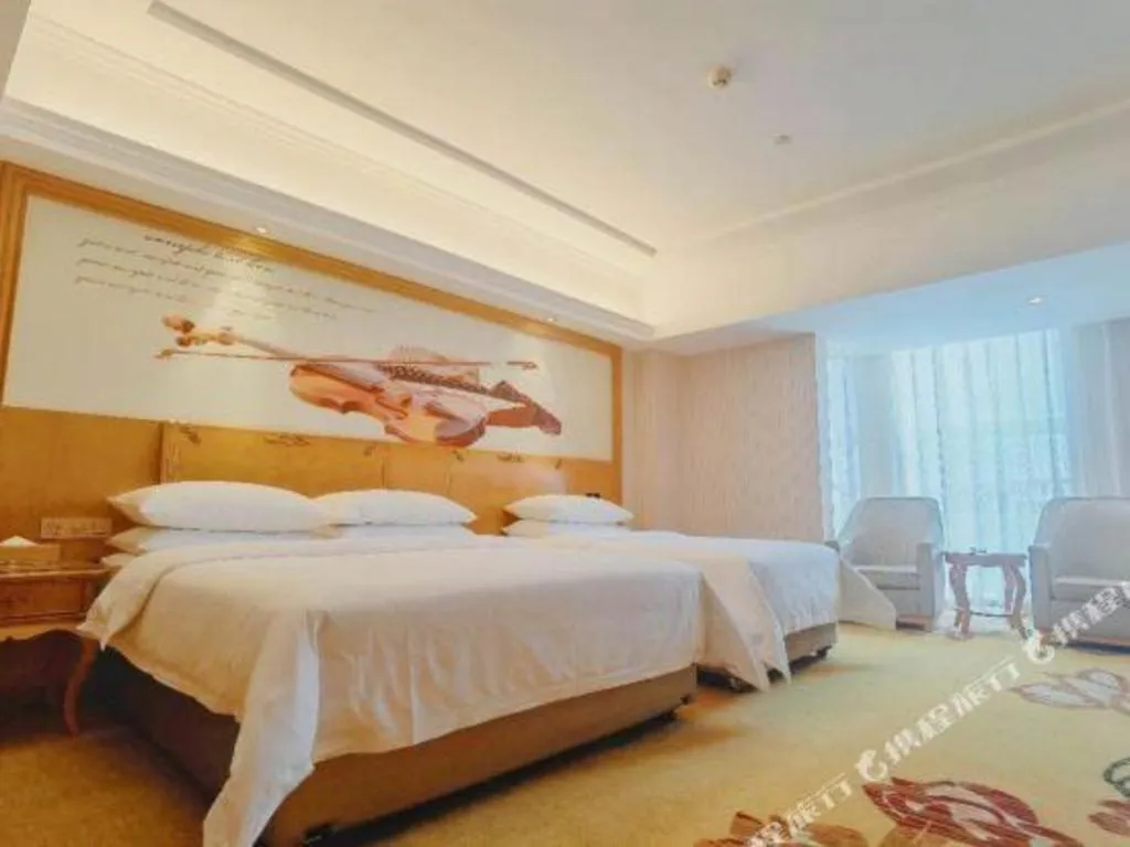 Bed in Vienna Hotel Henan Luoyang Jiudu Road Wanda