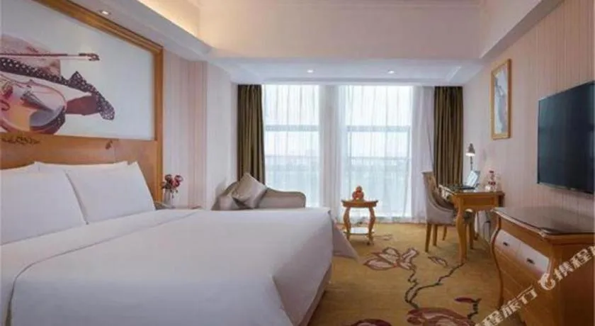 Bed in Vienna Hotel Henan Luoyang Jiudu Road Wanda