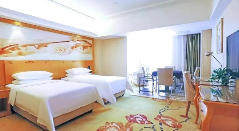 Bed in Vienna Hotel Henan Luoyang Jiudu Road Wanda