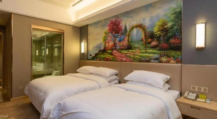 Bed in Vienna Hotel Jiangsu Zhangjiagang Passenger Terminal Station