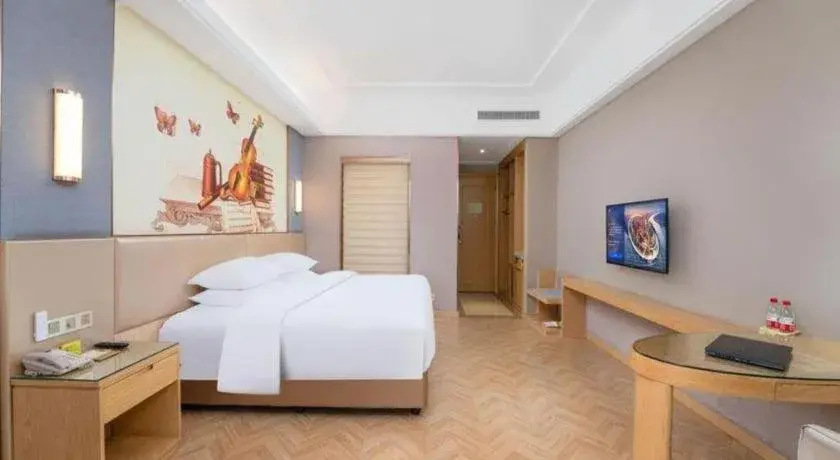 Bed in Vienna Hotel Jiangsu Zhangjiagang Passenger Terminal Station Bed in Vienna Hotel Jiangsu Zhangjiagang Passenger Terminal Station