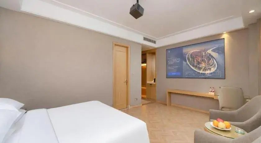 Bed in Vienna Hotel Jiangsu Zhangjiagang Passenger Terminal Station Bed in Vienna Hotel Jiangsu Zhangjiagang Passenger Terminal Station