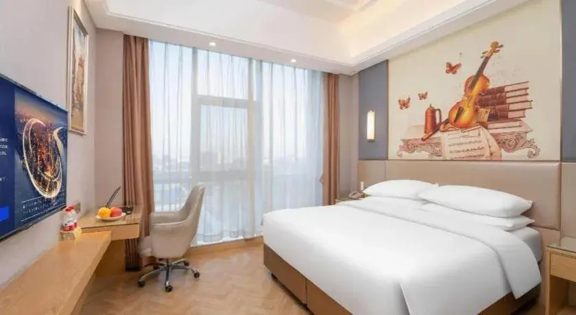 Bed in Vienna Hotel Jiangsu Zhangjiagang Passenger Terminal Station Bed in Vienna Hotel Jiangsu Zhangjiagang Passenger Terminal Station