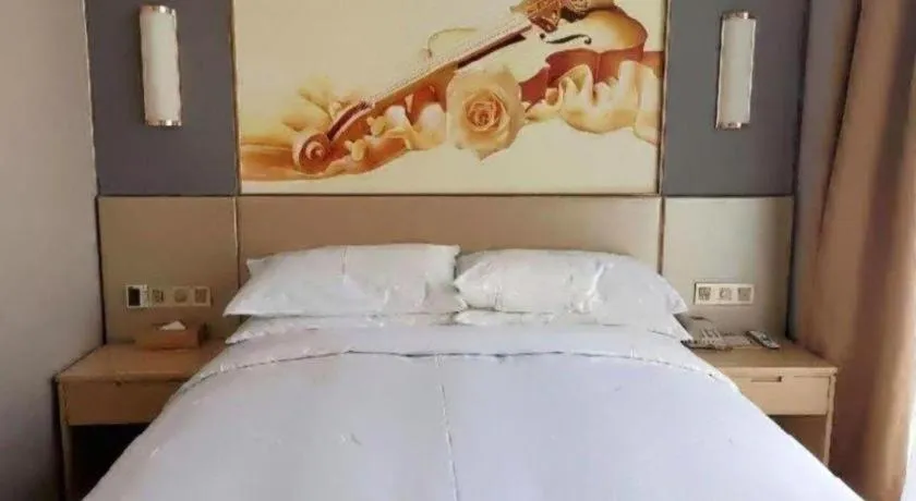 Bed in Vienna Hotel Jiangsu Zhangjiagang Passenger Terminal Station