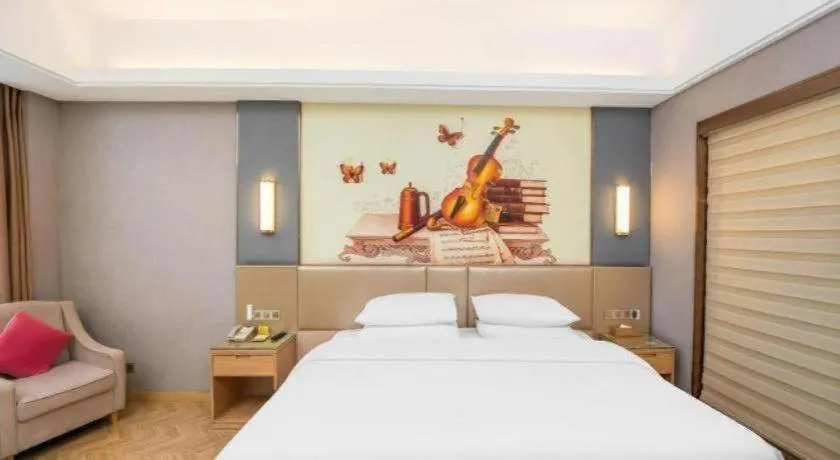 Bed in Vienna Hotel Jiangsu Zhangjiagang Passenger Terminal Station