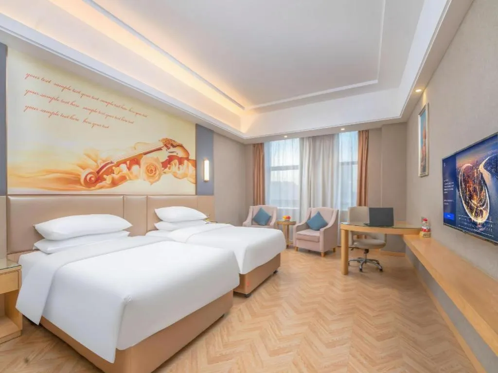 Bed in Vienna Hotel Jiangsu Zhangjiagang Passenger Terminal Station