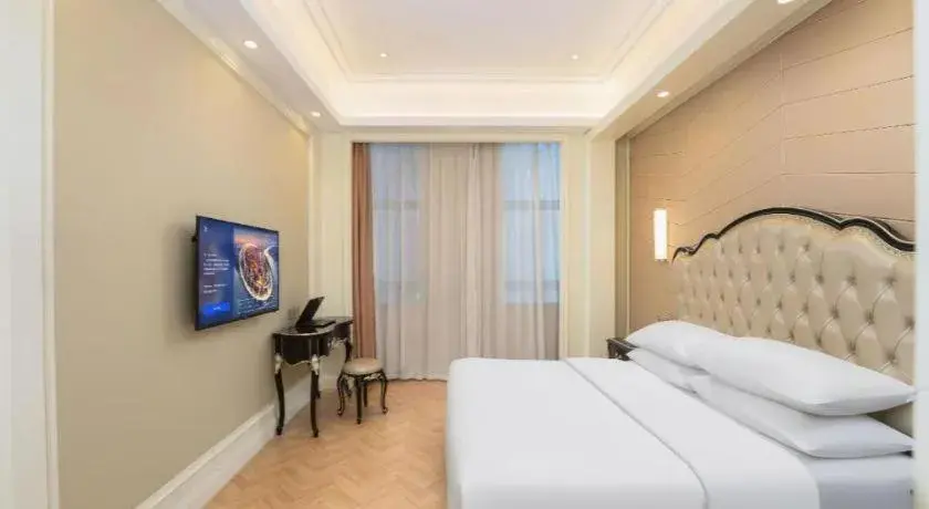 Bed in Vienna Hotel Jiangsu Zhangjiagang Passenger Terminal Station Bed in Vienna Hotel Jiangsu Zhangjiagang Passenger Terminal Station