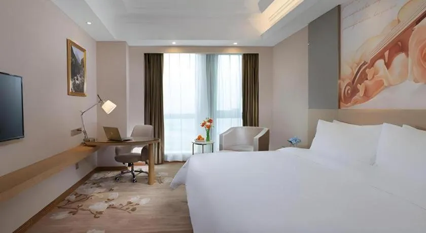 Bed in Vienna Hotel Jiangsu Zhangjiagang Passenger Terminal Station