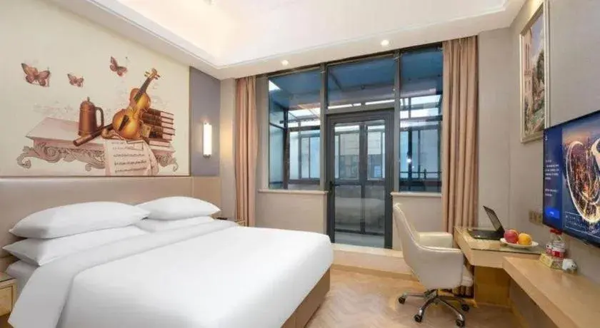 Bed in Vienna Hotel Jiangsu Zhangjiagang Passenger Terminal Station Bed in Vienna Hotel Jiangsu Zhangjiagang Passenger Terminal Station