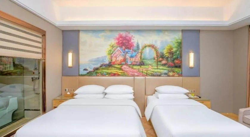 Bed in Vienna Hotel Jiangsu Zhangjiagang Passenger Terminal Station