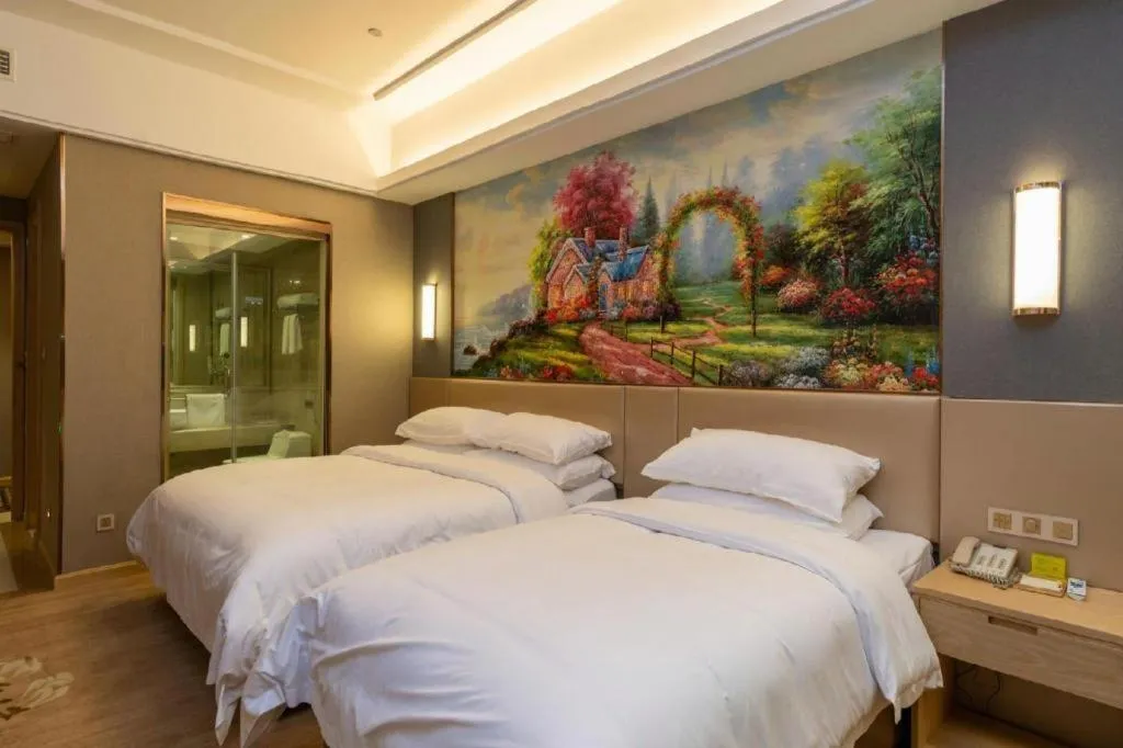 Bed in Vienna Hotel Jiangsu Zhangjiagang Passenger Terminal Station