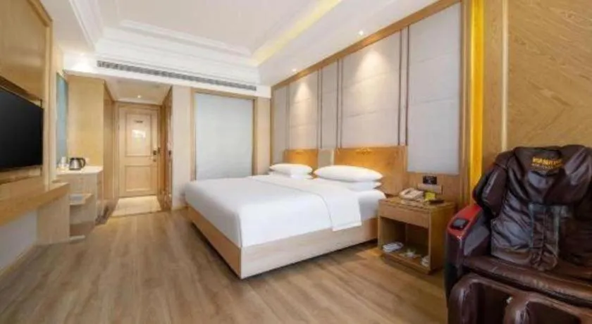 Bed in Vienna Hotel Jiangsu Kunshan Qiandeng Town