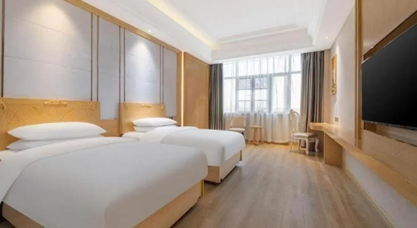 Bed in Vienna Hotel Jiangsu Kunshan Qiandeng Town