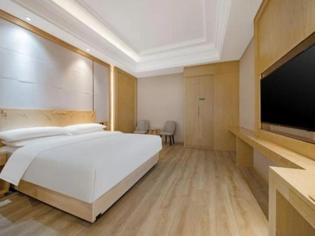 Bed in Vienna Hotel Jiangsu Kunshan Qiandeng Town