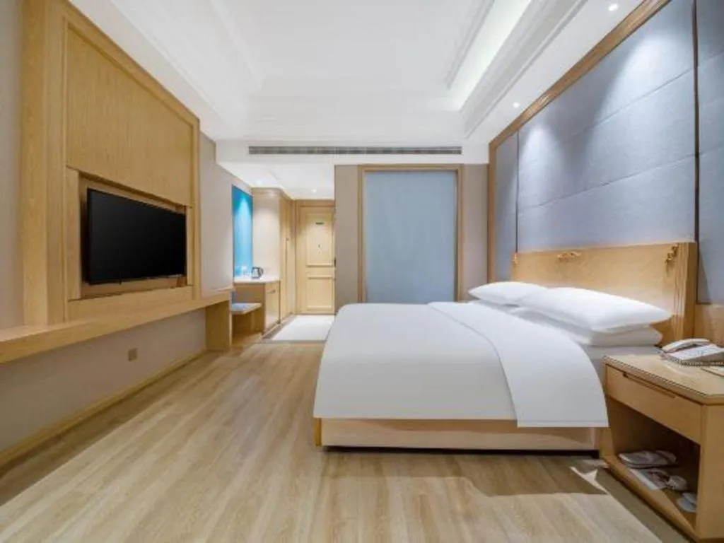 Bed in Vienna Hotel Jiangsu Kunshan Qiandeng Town